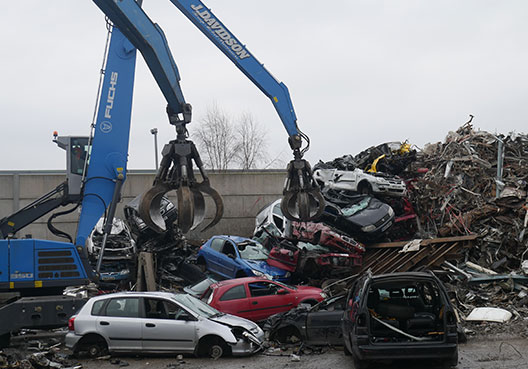 Crane and scrap cars